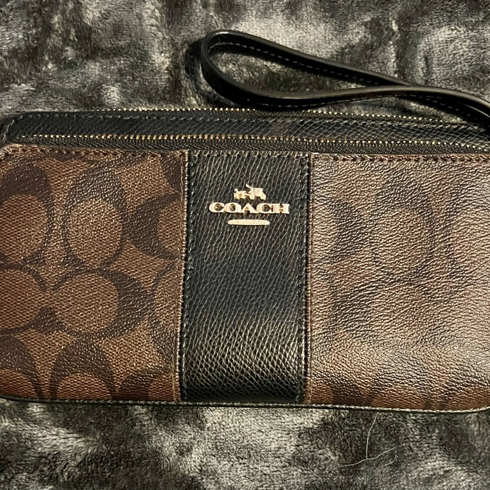 Coach Brown Dual Zipper Wristlet. 
Logo Monogram Print.